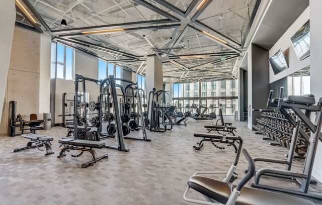 Well-equipped fitness center with a variety of athletic equipment
