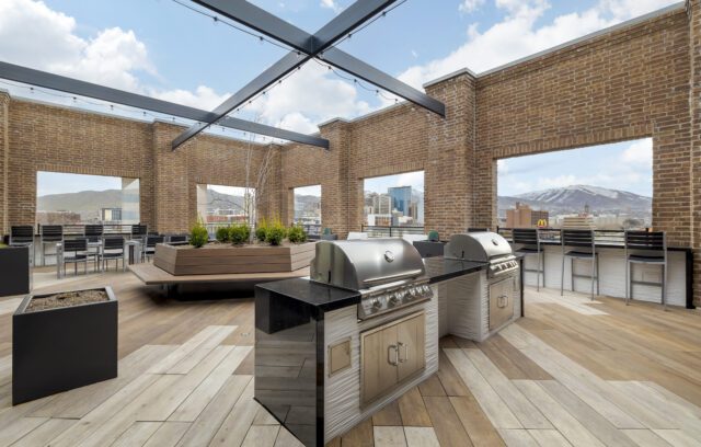 Outdoor kitchen area on the rooftop lounge at The Register