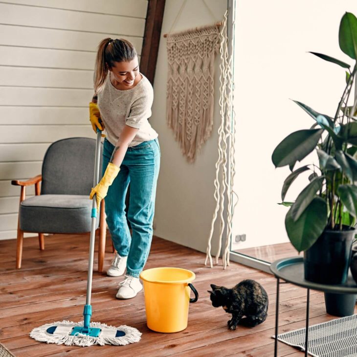 Women mopping the floor